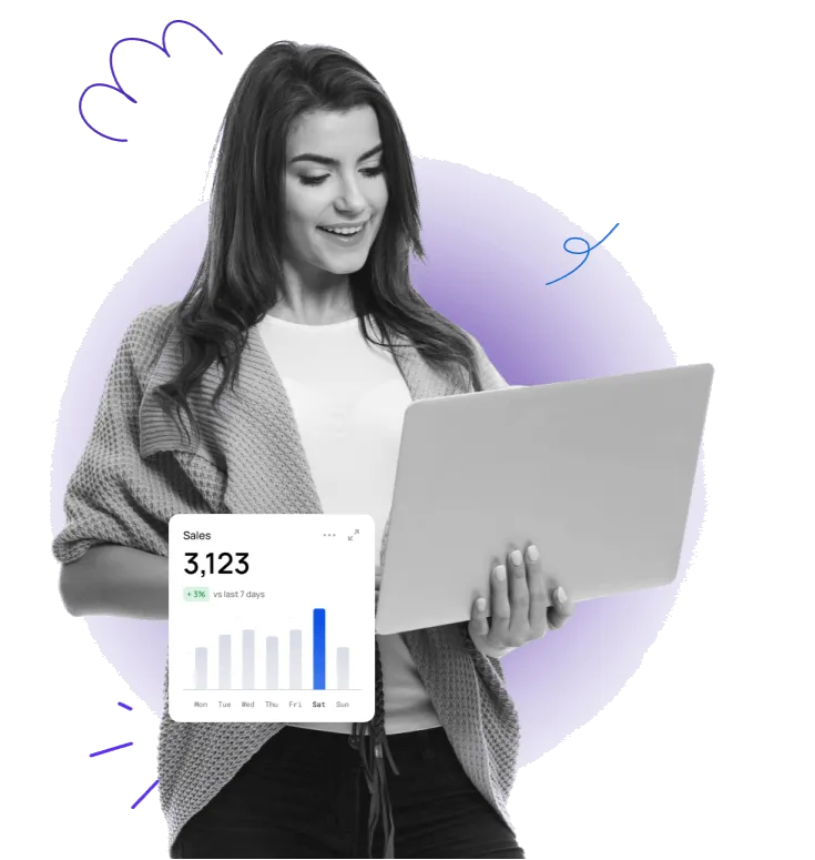 Professional with laptop beside a Sales performance card and chart, representing growth-focused WordPress builds